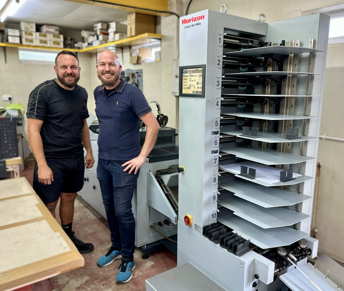 Iain Glendenning, Director of Print Production, with new Horizon print finishing equipment at Whites family-run print business in County Durham.